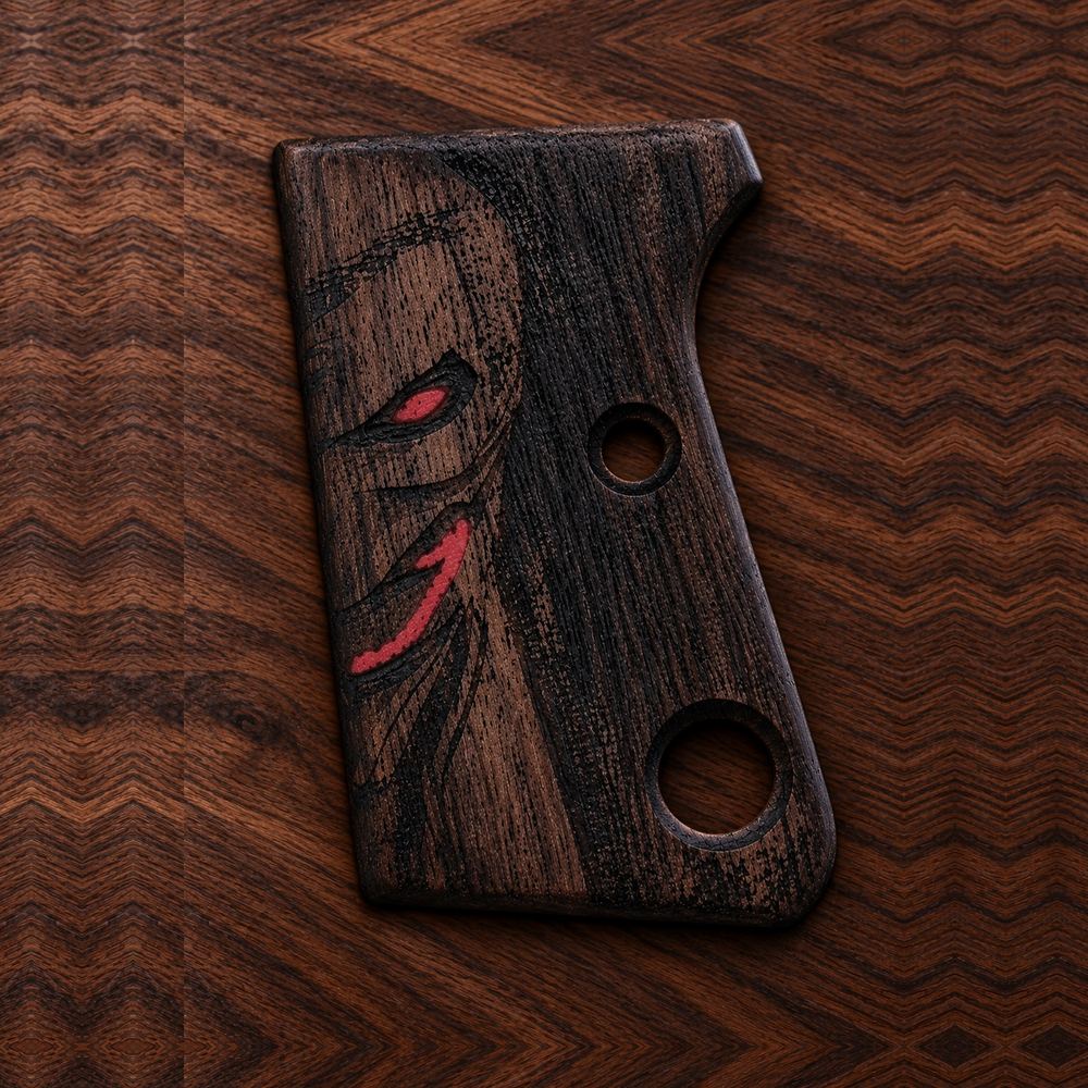 Cachas de nogal Astra Cub 6.35 - Relieve demonio de ojos rojos, nogal oscuro