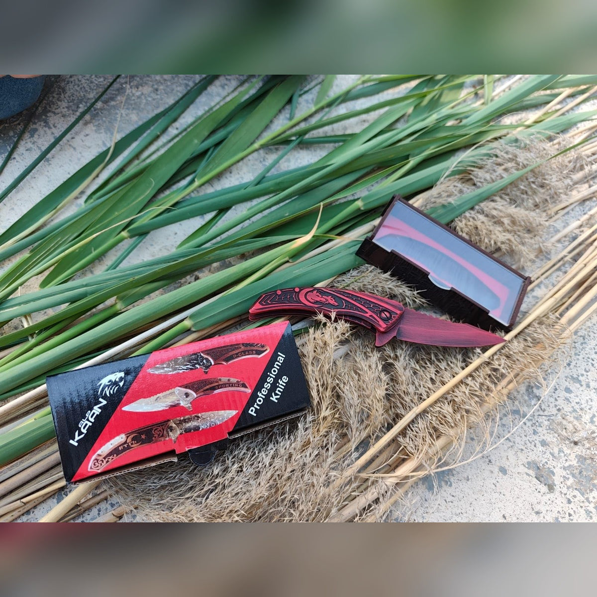 Wolf engraved folding pocket knife – Red open